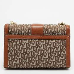 Pre Owned حقيبة كتف دي كي إن واي إيلا كبيرة قماش بنمط الشعار بني/بيج وجلد