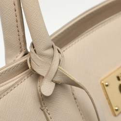 Pre Owned Dkny Heritage Lock Light Beige Signature Canvas and Leather Tote