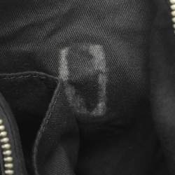 Pre Owned Dkny Black Canvas and Leather Studded Hobo