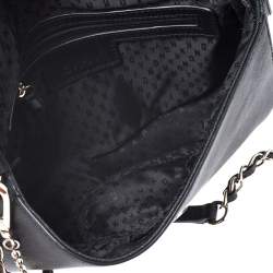 حقيبة كروس DKNY بريانت جلد أسو�د بقلاب
