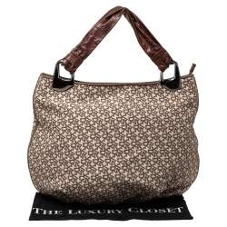 Pre Owned حقيبة هوبو دي كيه إن واي جلد و كانفاس مطبوع شعار الماركة بيج و بني