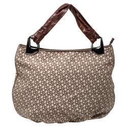 Pre Owned حقيبة هوبو دي كيه إن واي جلد و كانفاس مطبوع شعار الماركة بيج و بني