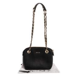 مملوكة مسبقًا حقيبة كتف دي كيه إن واي "كاميليا" دوم جلد أسود