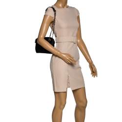 مملوكة مسبقًا حقيبة كتف دي كيه إن واي "كاميليا" دوم جلد أسود