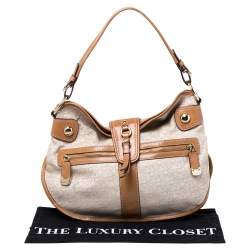 Pre Owned حقيبة دي كي إن واي كانفاس وجلد بيج/بني فاتح بالشعار