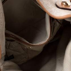 Pre Owned حقيبة دي كي إن واي كانفاس وجلد بيج/بني فاتح بالشعار