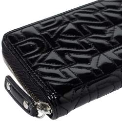 مملوكة مسبقًا محفظة دي كي إن واي جلد أسود لامع بسحاب محيط