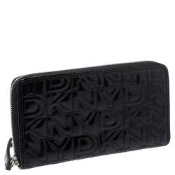 مملوكة مسبقًا محفظة دي كي إن واي جلد أسود لامع بسحاب محيط