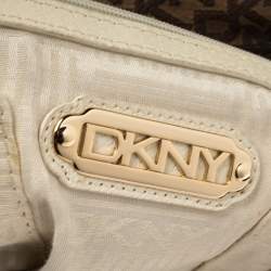 Pre Owned Dkny Brown Monogram Canvas and Leather Studded Hobo