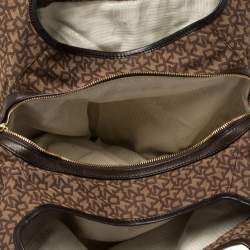 Pre Owned Dkny Brown Monogram Canvas and Leather Studded Hobo