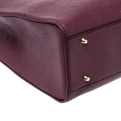 مملوكة مسبقًا Dkny Burgundy Leather Logo Plague Zip Tote