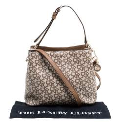 Pre Owned Dkny Beige/Brown Signature Coated Canvas and Leather Bryant Bucket Bag