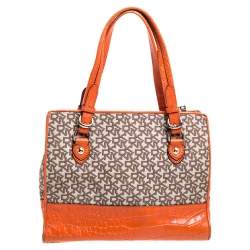 Pre Owned حقيبة دي كي إن واي جلد نقشة التمساح برتقالي وبيج بالشعار