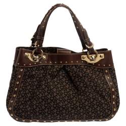 Pre Owned Dkny Brown/Black Signature Canvas and Leather Studded Satchel