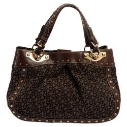 Pre Owned Dkny Brown/Black Signature Canvas and Leather Studded Satchel