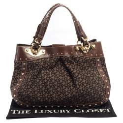 Pre Owned Dkny Brown/Black Signature Canvas and Leather Studded Satchel