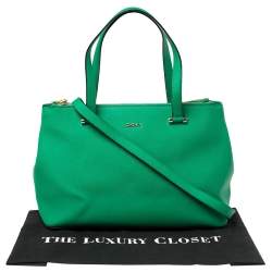 مملوكة مسبقًا حقيبة دي كي أن و اي دونا كاران جلد أخضر بسحاب مزدوج