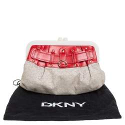 Pre Owned DKNY Beige/Orange Signature Canvas and Leather Kisslock Frame Clutch
