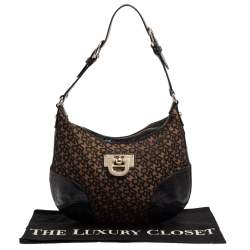 Pre Owned حقيبة هوبو دي كيه إن واي جلد و كانفاس مطبوع نقشة شعار الماركة أسود و بني