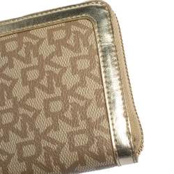 Pre Owned DKNY Beige Signature Coated Canvas and Leather Zip Around Wallet