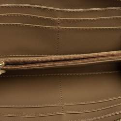 Pre Owned DKNY Beige Signature Coated Canvas and Leather Zip Around Wallet