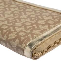 Pre Owned DKNY Beige Signature Coated Canvas and Leather Zip Around Wallet