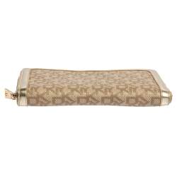 Pre Owned DKNY Beige Signature Coated Canvas and Leather Zip Around Wallet