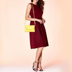 Pre Owned DKNY Yellow Leather Bryant Park Envelope Crossbody Bag