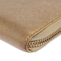 Pre Owned Dkny Metallic Beige Leather Zip Around Wallet