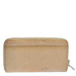 Pre Owned Dkny Metallic Beige Leather Zip Around Wallet