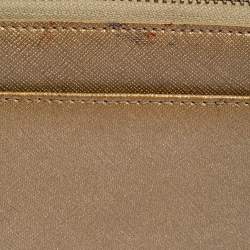 Pre Owned Dkny Metallic Beige Leather Zip Around Wallet