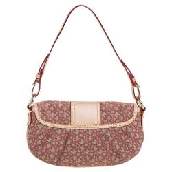 مملوكة مسبقًا حقيبة دي كي ان واي باغيت جلد وكانفاس بيج بالشعار