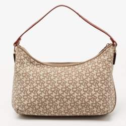 Pre Owned حقيبة دي كي إن واي باغويت جلد وكانفاس بالشعار بيج/لون الصدأ