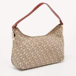 Pre Owned حقيبة دي كي إن واي باغويت جلد وكانفاس بالشعار بيج/لون الصدأ