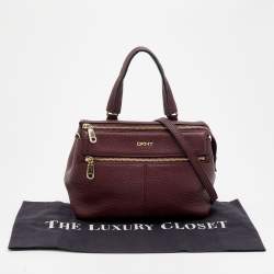 Pre Owned حقيبة ساتشل دي كي إن واي جلد مُحبب برقوقي