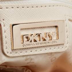 Pre Owned حقيبة يد توتس دي كي إن واي جلد بيج مبطن بسلسلة وقفل دوار