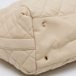 Pre Owned حقيبة يد توتس دي كي إن واي جلد بيج مبطن بسلسلة وقفل دوار