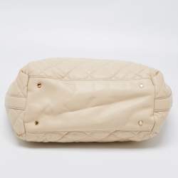 Pre Owned حقيبة يد توتس دي كي إن واي جلد بيج مبطن بسلسلة وقفل دوار