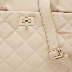 Pre Owned حقيبة يد توتس دي كي إن واي جلد بيج مبطن بسلسلة وقفل دوار