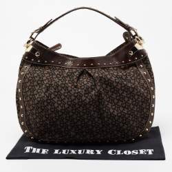 Pre Owned DKNY Brown/Black Signature Canvas And Leather Studded Hobo