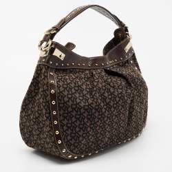 Pre Owned DKNY Brown/Black Signature Canvas And Leather Studded Hobo