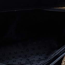 مملوكة مسبقًا حقيبة  يد توتس دي كي إن واي جلد أسود بقلاب مغناطيسي