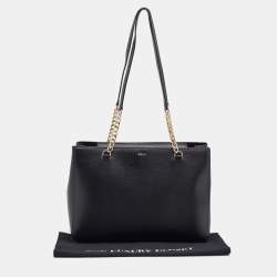 مملوكة مسبقًا حقيبة  يد توتس دي كي إن واي جلد أسود بقلاب مغناطيسي