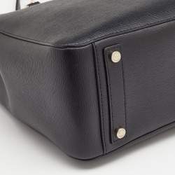 مملوكة مسبقًا حقيبة  يد توتس دي كي إن واي جلد أسود بقلاب مغناطيسي