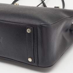 مملوكة مسبقًا حقيبة  يد توتس دي كي إن واي جلد أسود بقلاب مغناطيسي