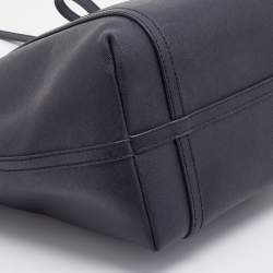 Pre Owned حق يبة يد توتس دي كي إن واي جلد أسود سحاب علوي 