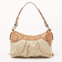 Pre Owned Dkny Beige/Light Green Monogram Canvas and Leather Buckle Baguette Bag 