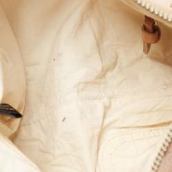 Pre Owned Dkny Beige/Light Green Monogram Canvas and Leather Buckle Baguette Bag 