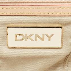 Pre Owned Dkny Pink/Beige Signature Canvas And Leather Pushlock Baguette