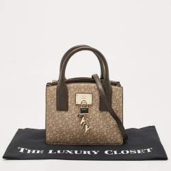 Pre Owned Dkny Brown/Beige Signature Coated Canvas and Leather Padlock Charm Tote
